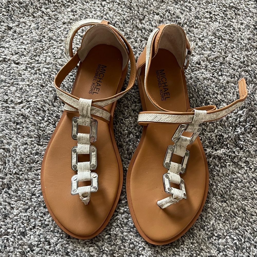 Michael Kors Sandals- EUC with very little wear to the bottoms. No other flaws.